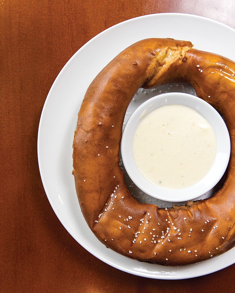The Big Buoy Pretzel, served with warm queso sauce, is specially made for Charlie’s on Prior.