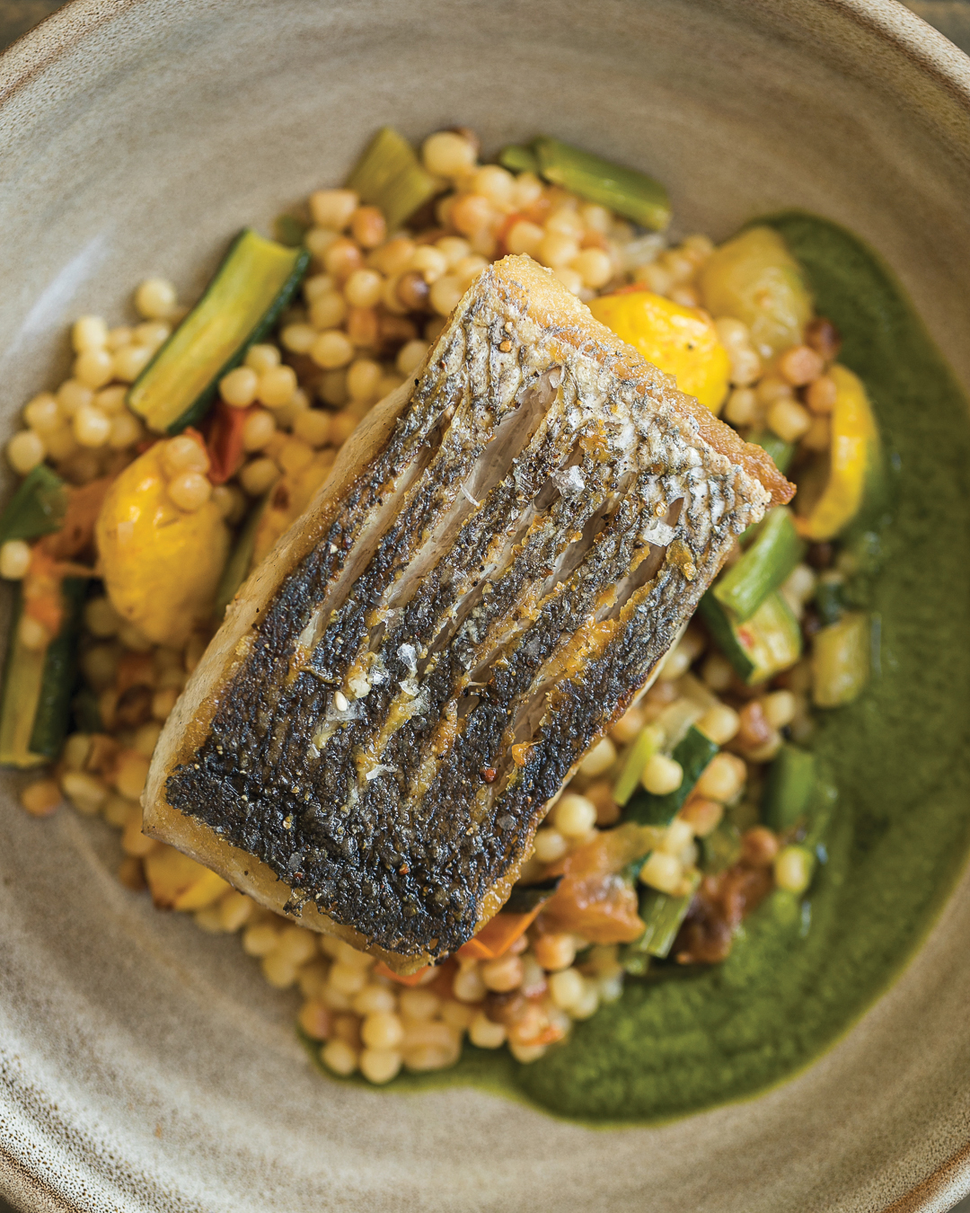 Market fish with baby squash, fregola and salsa verde from Kyndred Hearth.