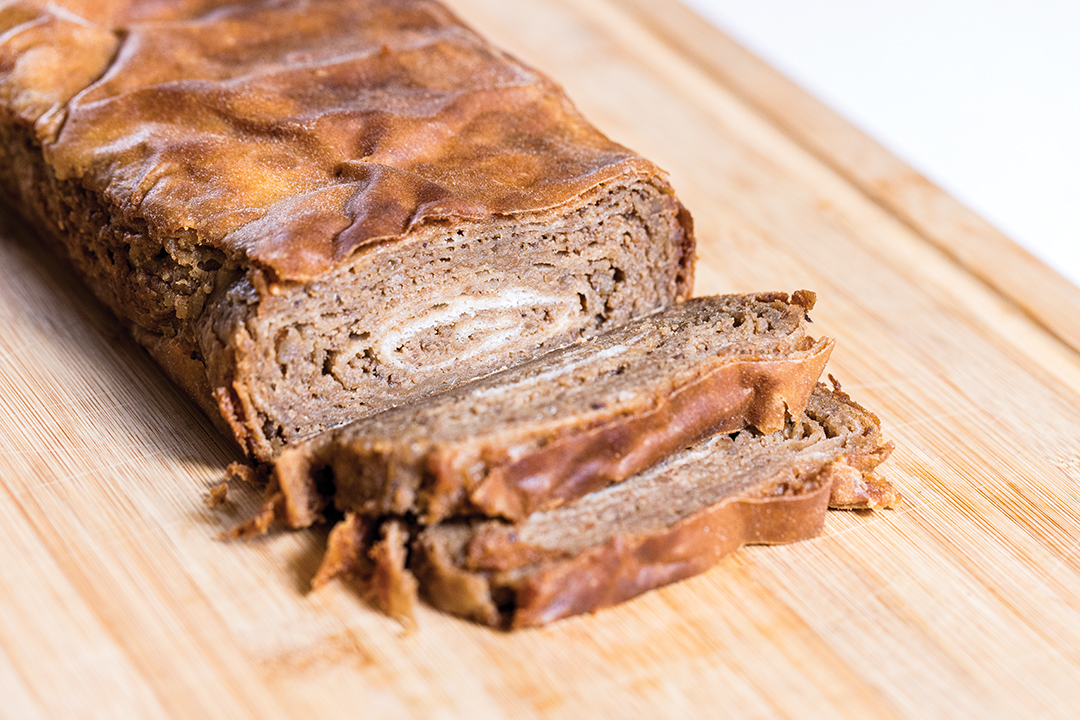 Lisa Haggstrom’s walnut potica is made by stretching dough into a very thin layer, topping it with a filling, rolling it up and baking it in a loaf pan.
