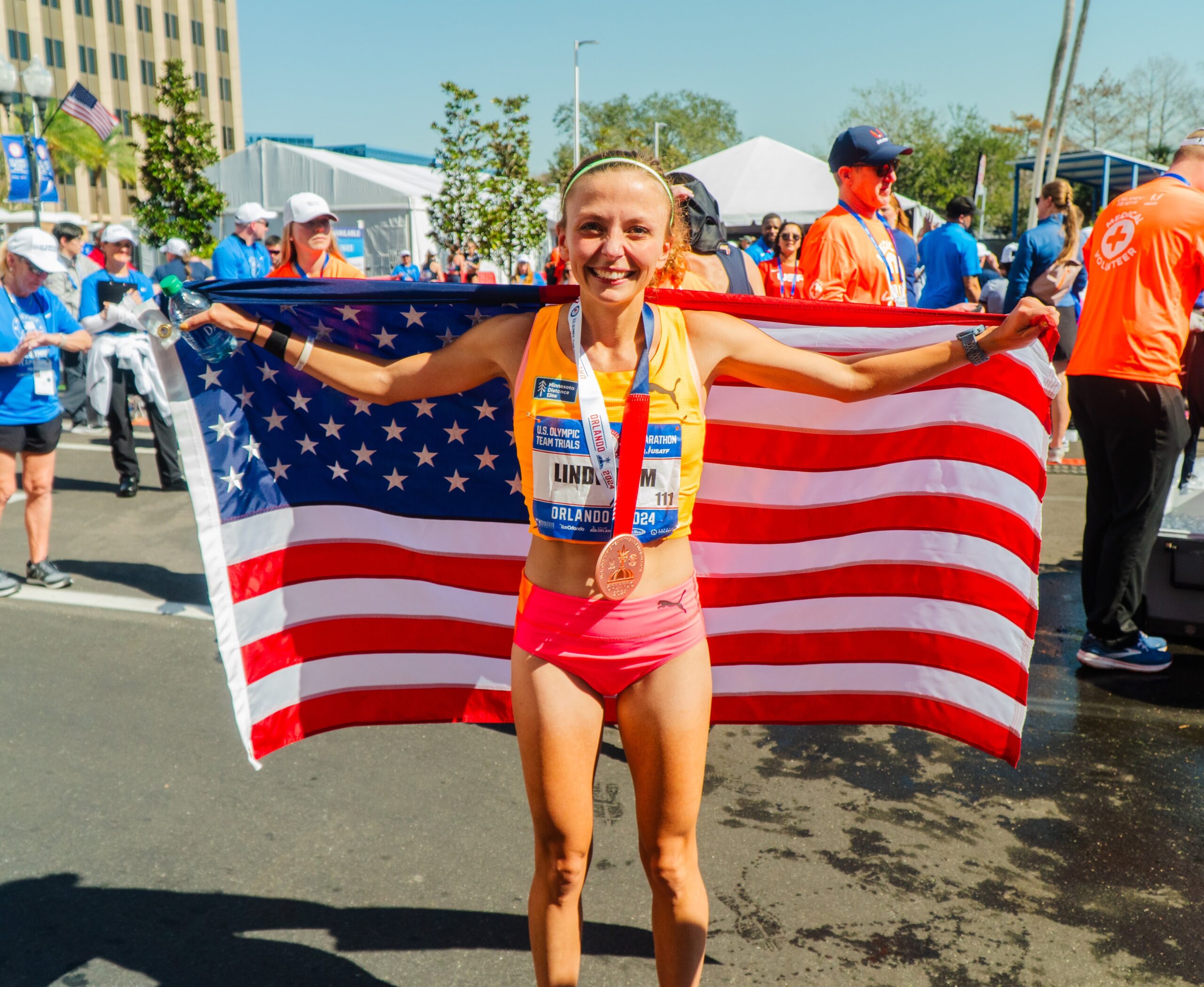 Dakotah Lindwurm wearing her third place medal at the Orlando, Florida U.S. Olympic Marathon Trials.