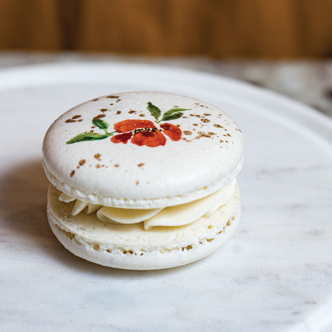 The intricately handpainted designs on Safeera Inayath’s macarons have made them a centerpiece of her cottage bakery, Sugar Dust & Sprinkles.