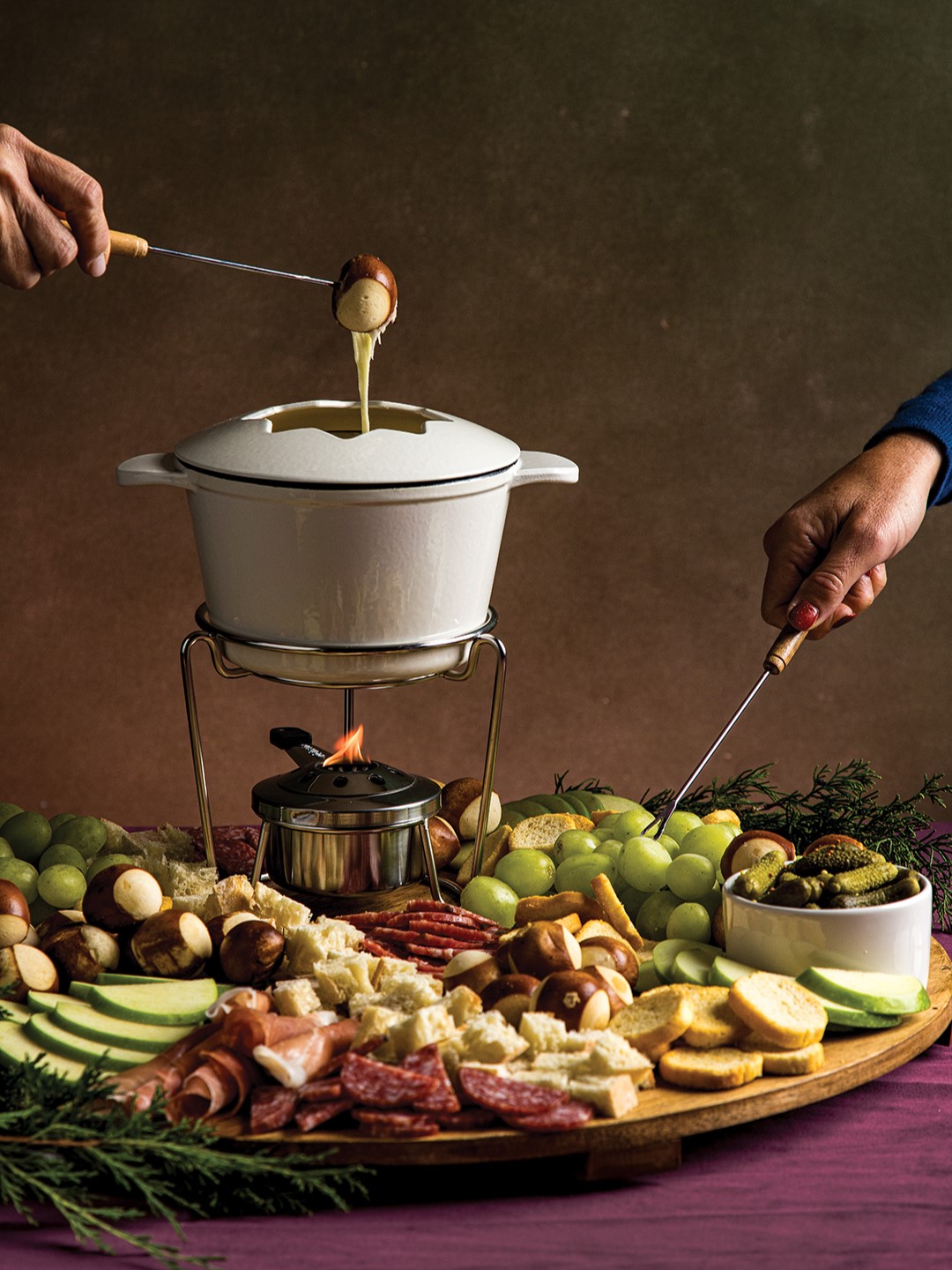 Serving fondue encourages guests to linger and chat as they eat.