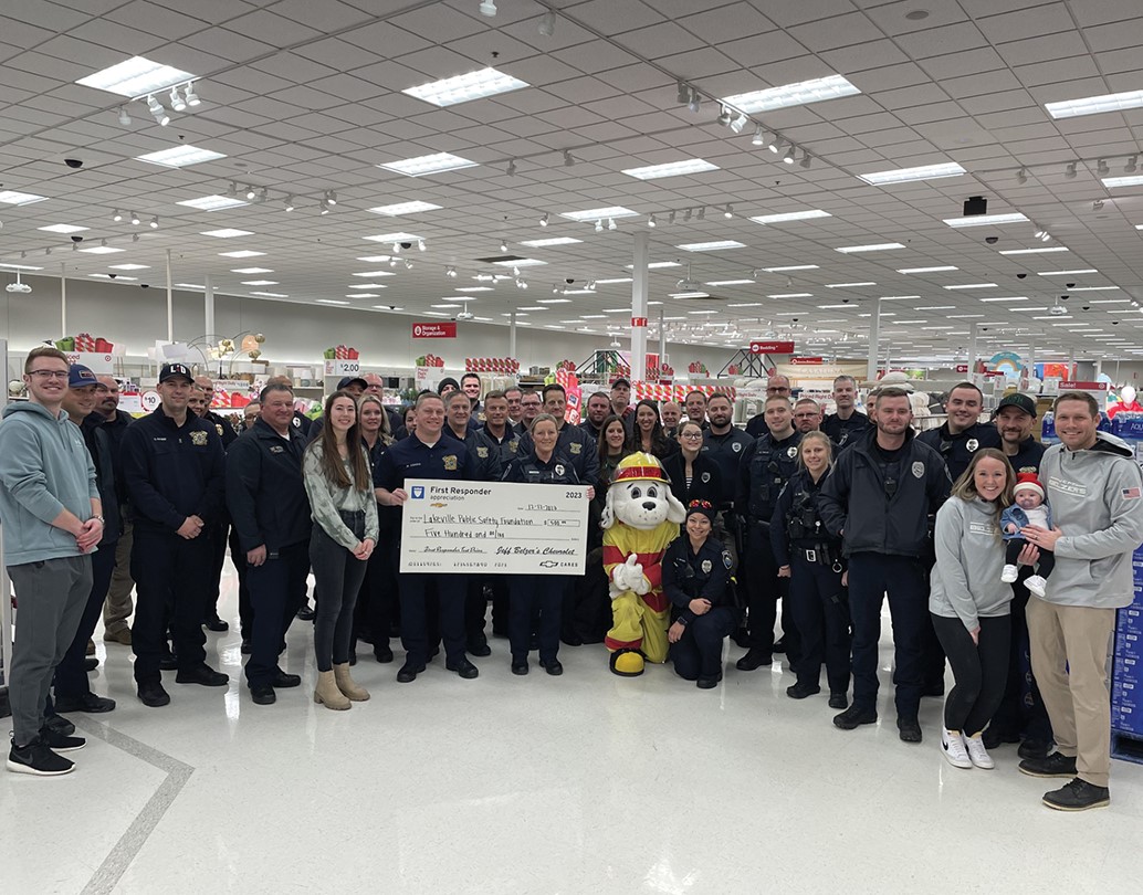 First responders volunteer their time to help kids buy presents for thier families in 2023.