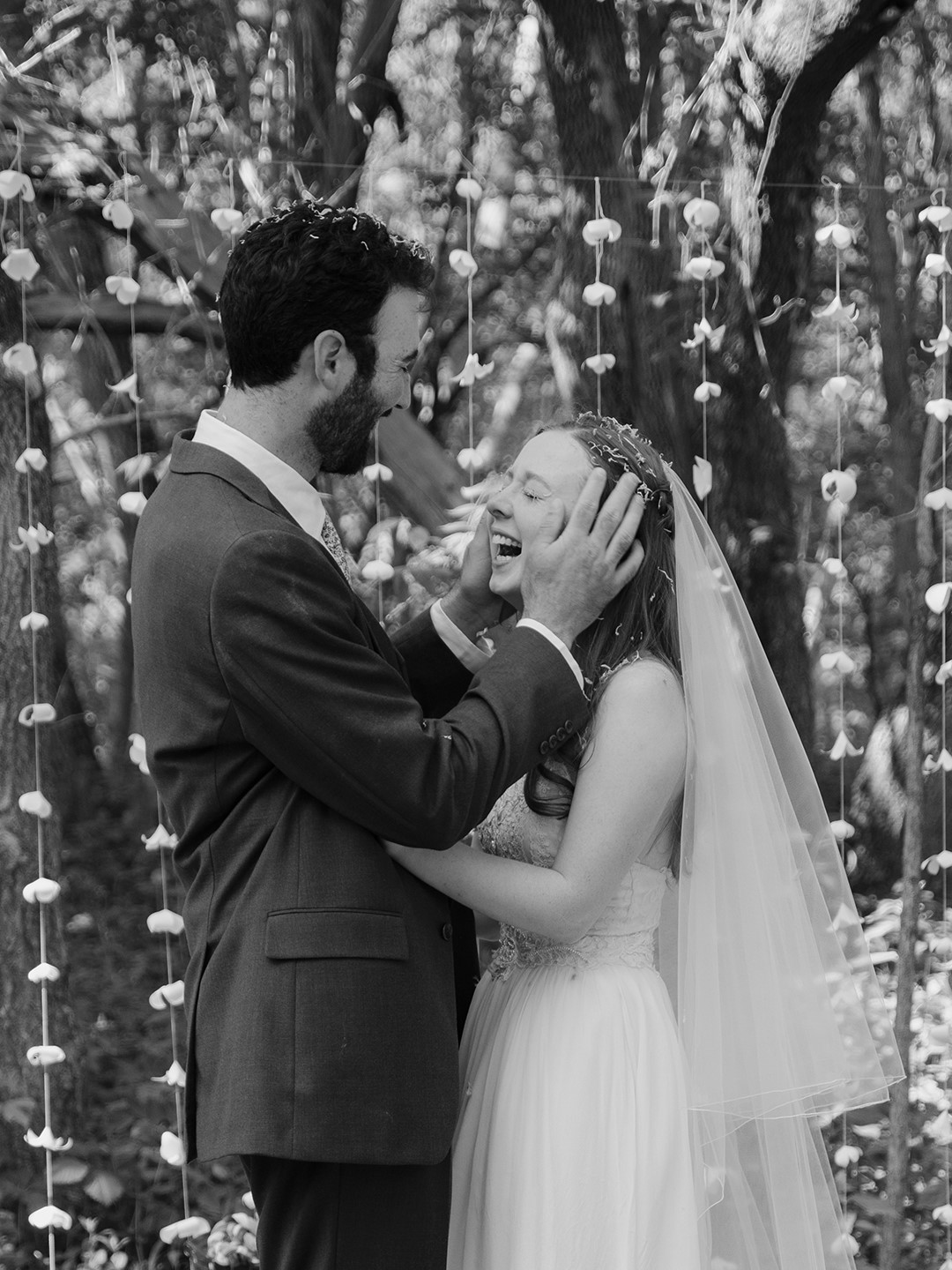 The groom’s brown, three-piece custom suit from Milbern Clothing Co. was inspired—in fit, style and material—by 1930s cinema stars like Jimmy Stewart. An acorn-patterned tie and boots from Red Wing Shoes completed the look.