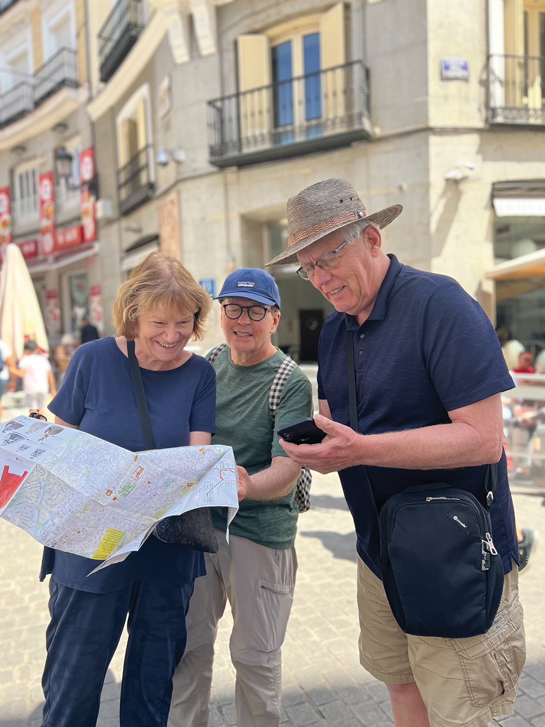 A group of travelers from Lakeville resident Colleen Berg’s spring trip to Portugal and Spain navigate the streets of Madrid.