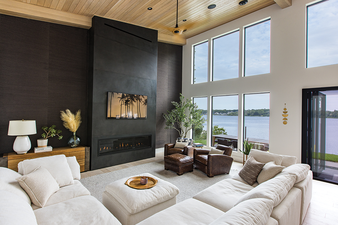 The main living area in the Johnsons’ home overlooking Prior Lake offers sweeping lake views. 