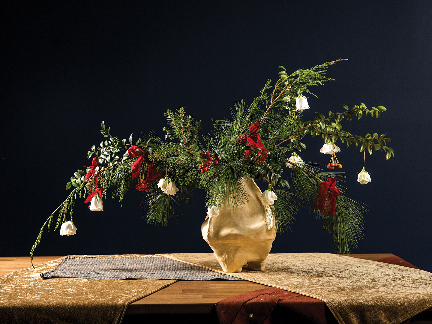 Floral design: Cedar Rae Floral; Ceramic vase: Gunner Jenrich.