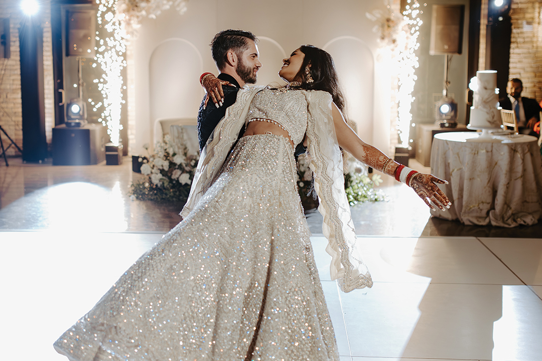 Aarushi Sarkari and Shane Will hit the dance floor at the grand reception following their Christian wedding ceremony.