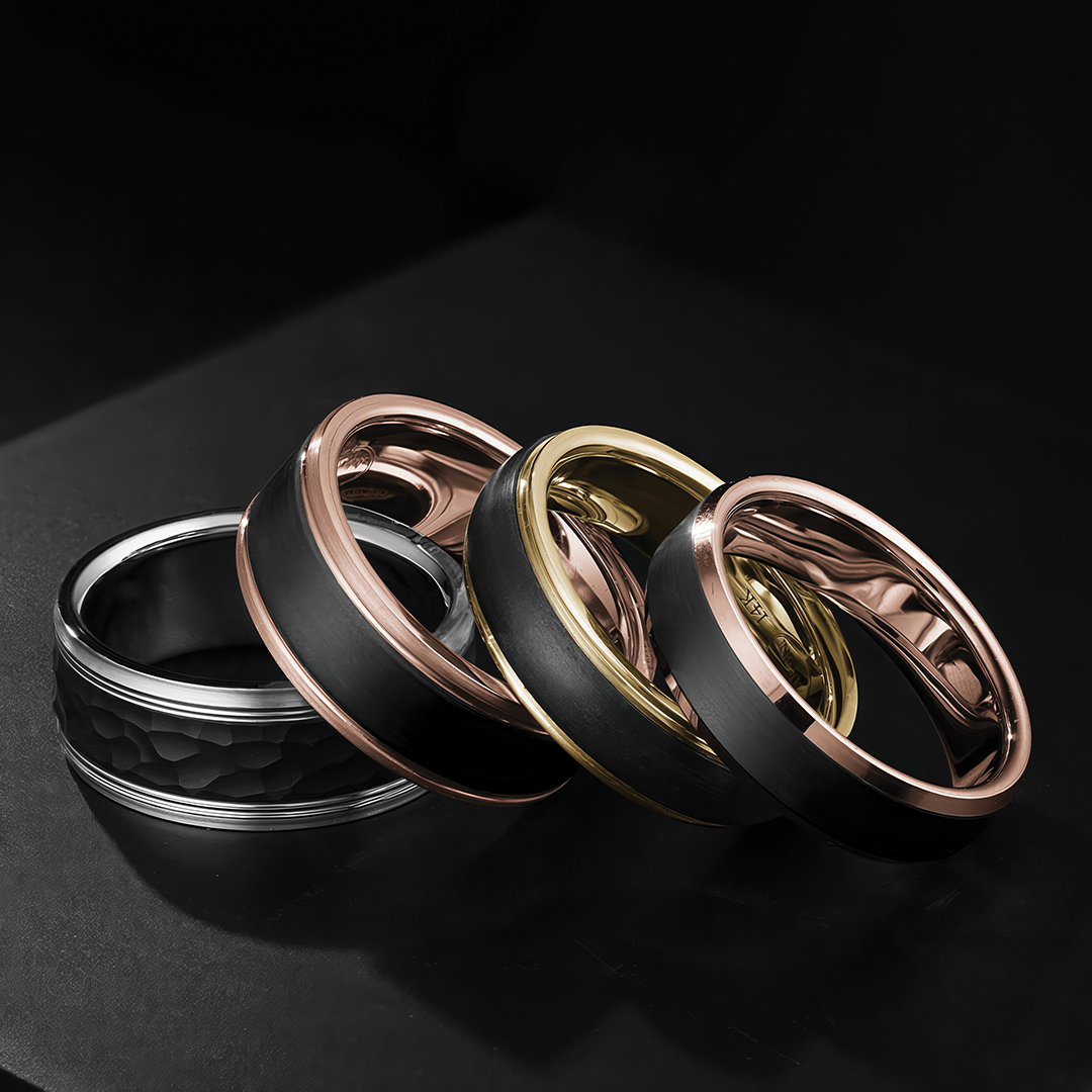 Men’s rings feature a mix of tantalum and gold in the Mardini line from Malo Bands.