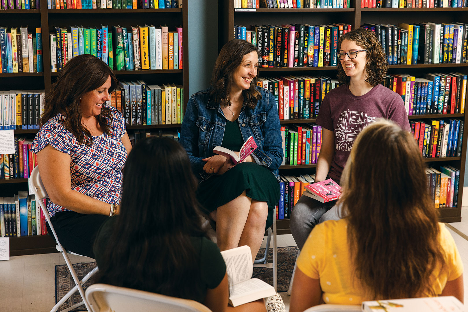 Avid reader Bethany Foulds and Ashley Christopherson, owner of Niche Books in Lakeville, chat at the bookstore’s Paperback Book Club.