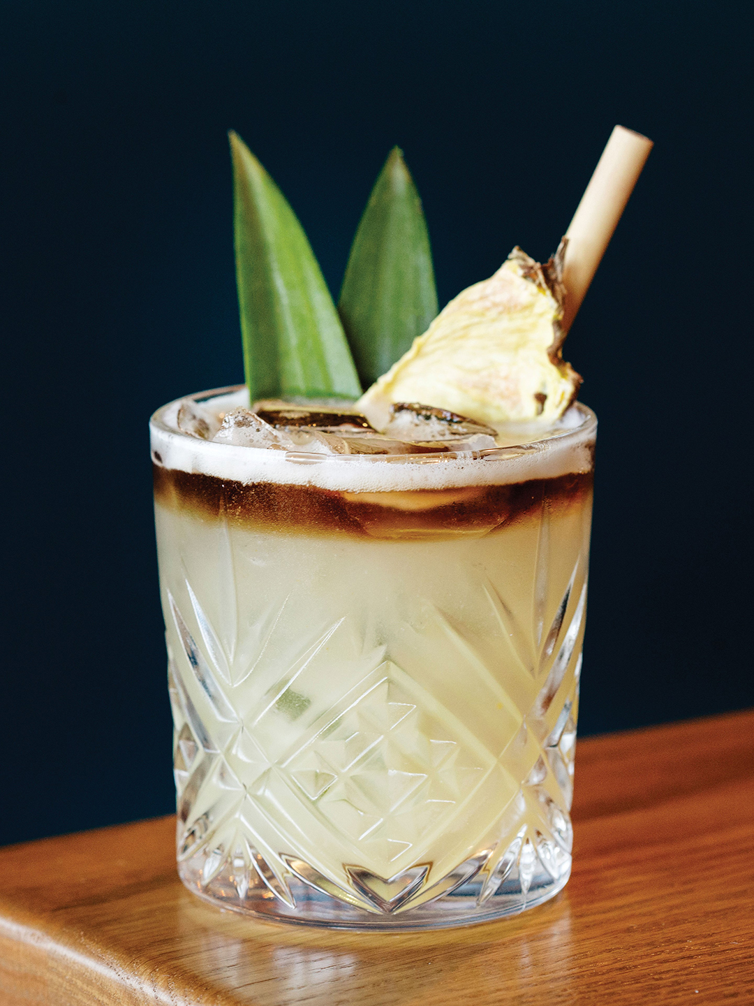 Mixed with fresh juice, Pau Hana’s popular Kona Mai Tai tastes as good as it looks.
